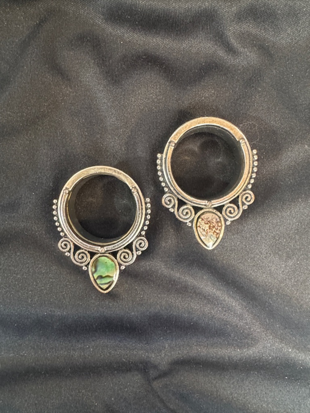 Silver color ear plug tunnels
